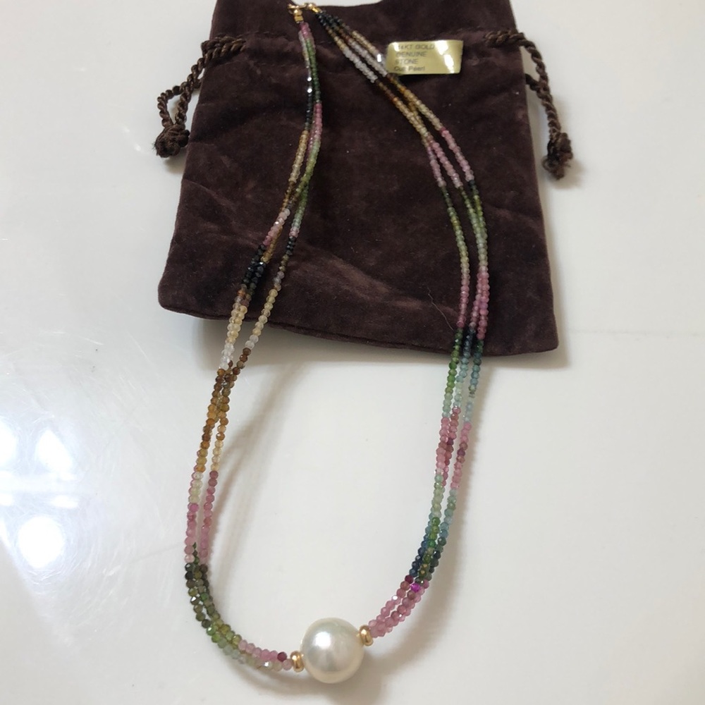 14k gold with genuine Tourmaline and a Cult. pearl